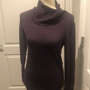 Dark purple turtleneck sweater. button sleeves